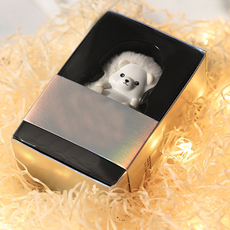 Rechargeable plush hand warmer as a polar bear or panda