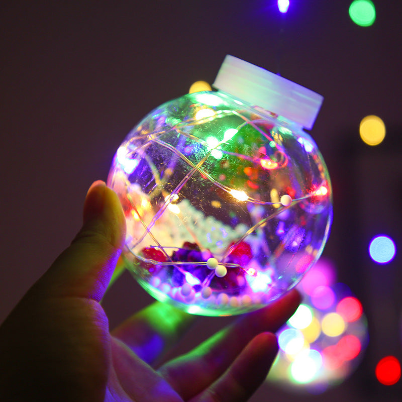 Curtain light with baubles and Christmas figures