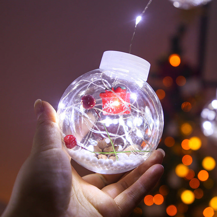 Curtain light with baubles and Christmas figures