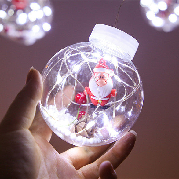 Curtain light with baubles and Christmas figures