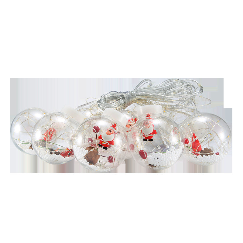 Curtain light with baubles and Christmas figures