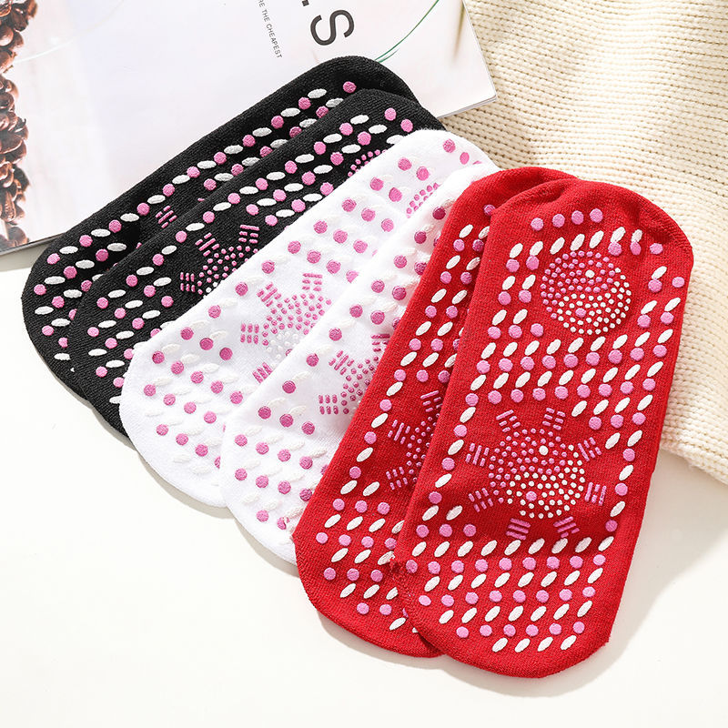 Self-heating socks with tourmaline and acupressure nubs