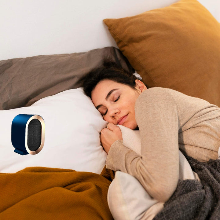 Ceramic fan heater with two settings, quiet below 36 dB