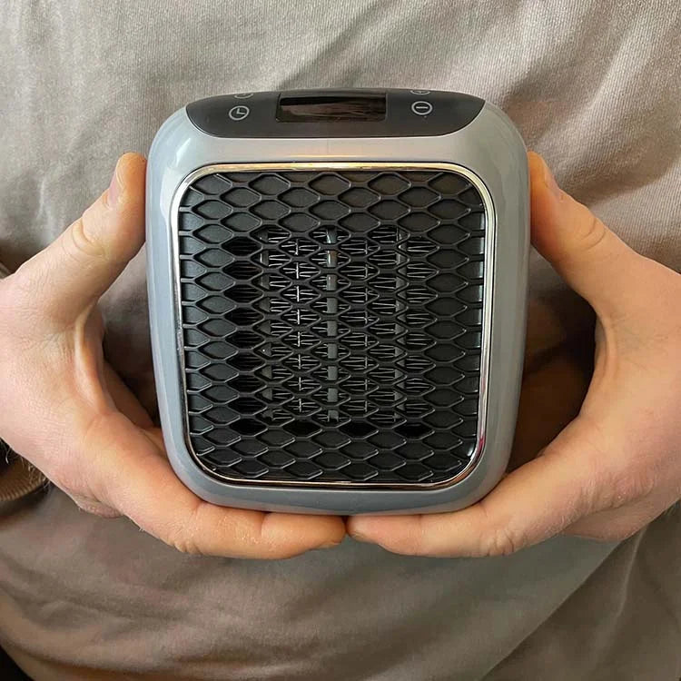 Compact 800 W electric heater with timer
