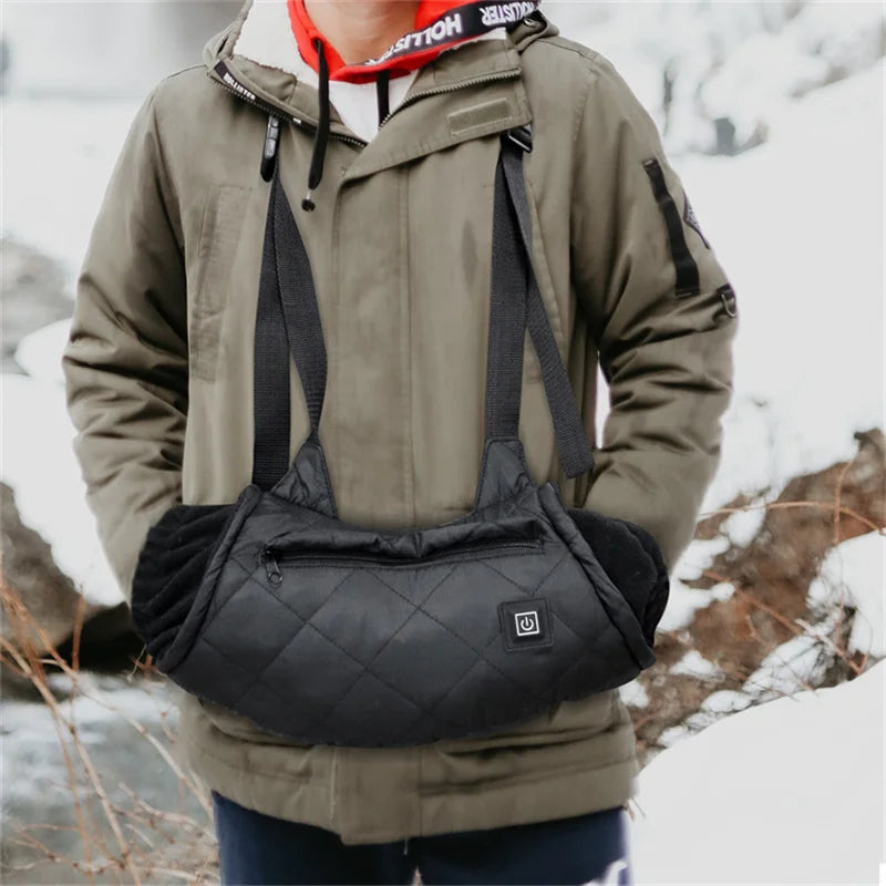 Heated hand muff with three heat settings and shoulder strap
