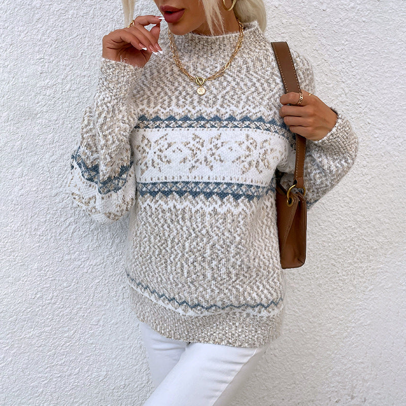 Women's knitted Christmas jumper with snowflakes and half-polo neck