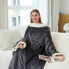 Heated wearable blanket with sleeves and foot pocket in sherpa fleece