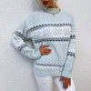Women's knitted Christmas jumper with snowflakes and half-polo neck